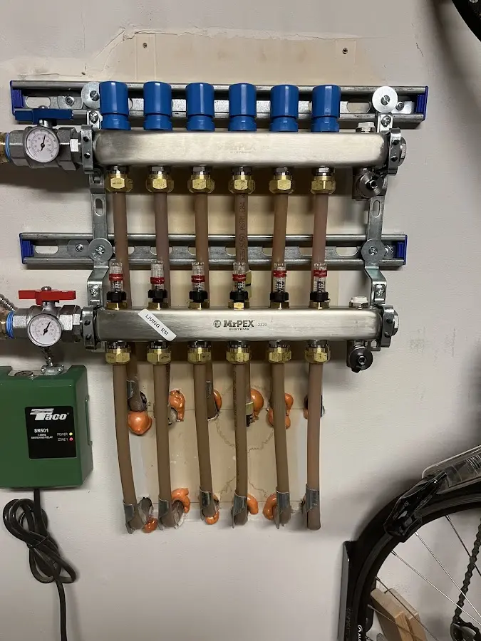 Plumber performing Water Heater Repair at a residential property in Whitehall